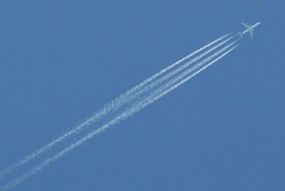 July 21, 2011 - A plane leaves a condensation trail while crossing the southern part of town.© Dick Bartlett