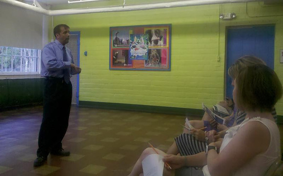 July 19, 2011 - Center School Principal finalist Christopher Kennedy answers questions from the crowd at the public forum held at Center School.© Michelle Murdock