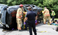 July 19, 2012 - Several people were injured and taken to UMass folowing this rollover accident on Rt 495 northbound near exit 21. More photos at Scene in Hopkinton.© Dick Bartlett