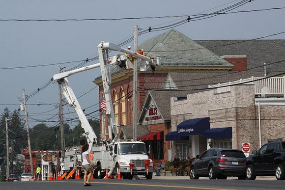 July 21, 2011 - NStar crews were changing some wiring in front of the town hall on a hot July day.© Dick Bartlett